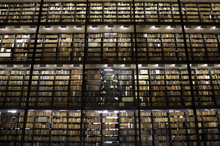 Towering shelves of books in a library